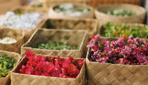 baskets of colourful flowers to make a hawaiian lei