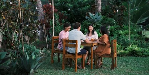 a group dining at Common Ground in Kauai